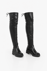 Black knee-high boots on a white background
